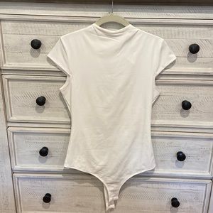 White mock neck bodysuit